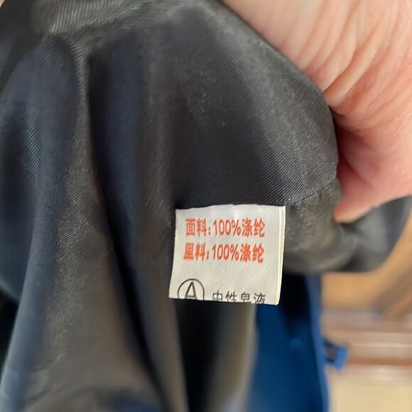Woman’s Black coat with flowers on the front and back - Picture 10 of 12